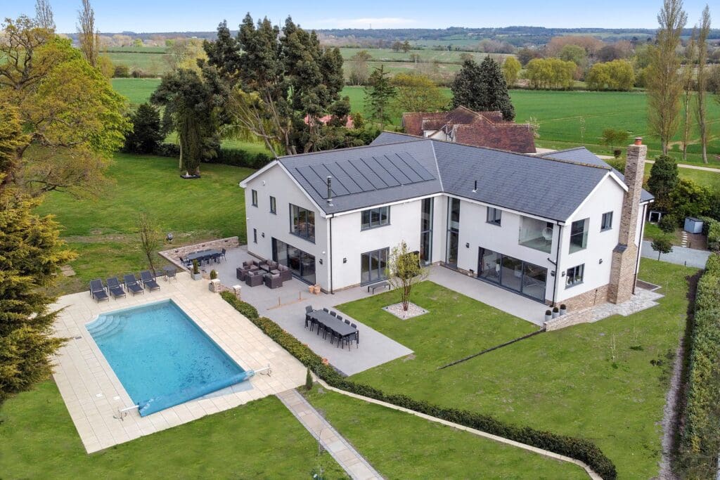 Modern house with pool and garden.