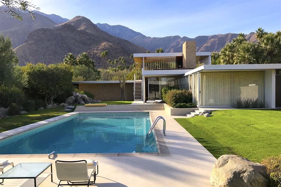 Modern house with pool and mountain view.